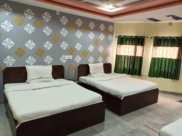 Hotel Gokul Palace : photo 3 de la chambre chambre familiale supérieure