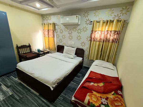 Hotel Gokul Palace : photo 2 de la chambre chambre triple deluxe