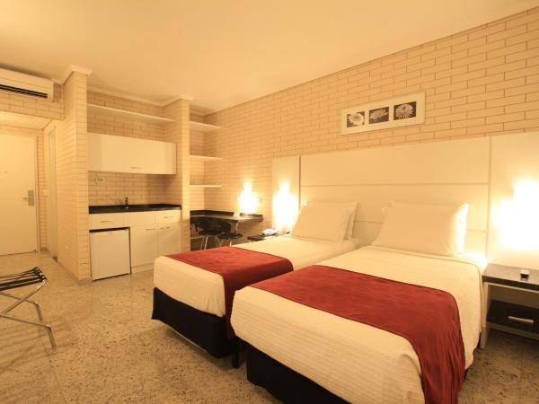 Hotel Confiance Prime Batel : photo 1 de la chambre chambre lits jumeaux supérieure