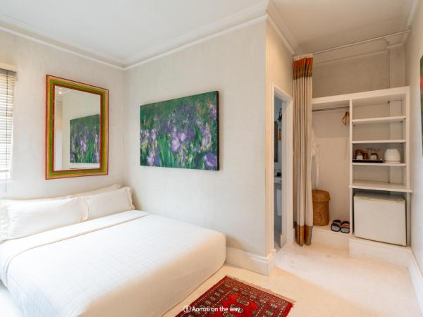 At Niman : photo 8 de la chambre 2 bed room king size bed and queen size bed