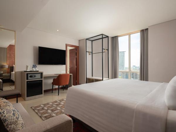 Hotel Santika Premiere Gubeng Surabaya : photo 2 de la chambre suite junior