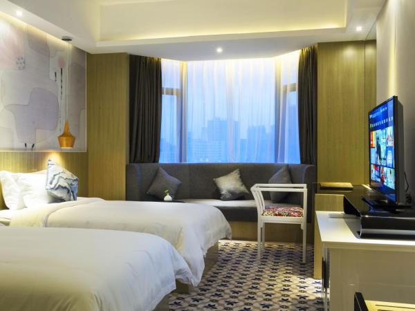 Paco Hotel Tianpingjia Metro Guangzhou - Canton Fair free shuttle bus : photo 1 de la chambre chambre lits jumeaux supérieure