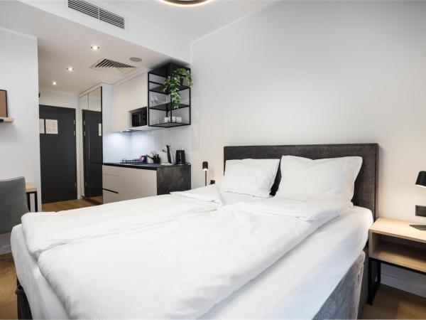 City Break Plac Wolności 6 Aparthotel : photo 1 de la chambre appartement avec balcon