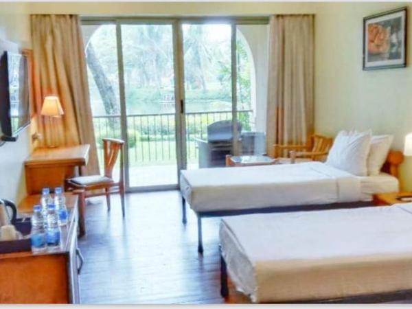 Ibiza The Fern Resort & Spa, Kolkata : photo 2 de la chambre chambre lit queen-size - vue sur jardin