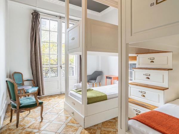 Casa Gracia : photo 1 de la chambre bed in 4-bed female dormitory room with city view