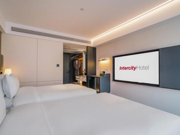 Intercity Hangzhou West Lake Huanglong Hotel : photo 1 de la chambre chambre lits jumeaux deluxe