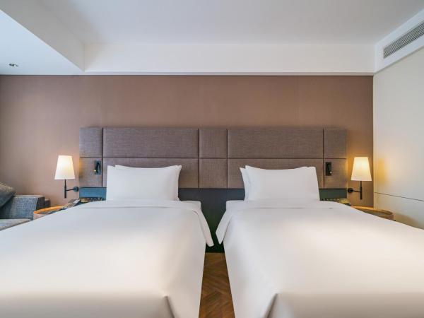 Intercity Hangzhou West Lake Huanglong Hotel : photo 3 de la chambre chambre lits jumeaux deluxe