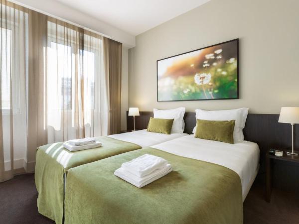 Riversuites : photo 4 de la chambre chambre lits jumeaux supérieure