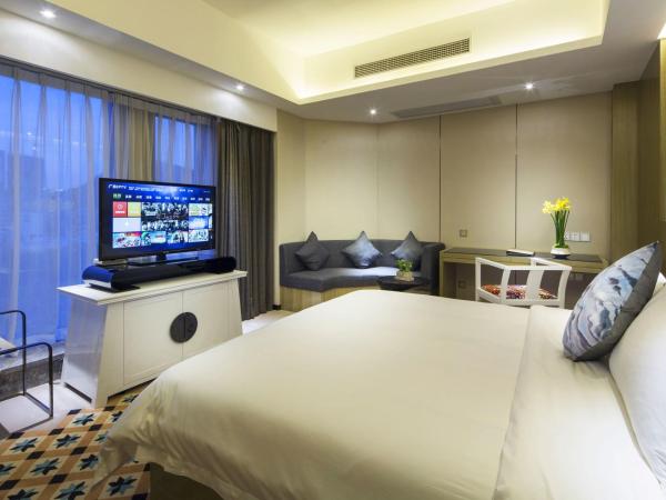 Paco Hotel Tianpingjia Metro Guangzhou - Canton Fair free shuttle bus : photo 2 de la chambre chambre supérieure lit queen-size