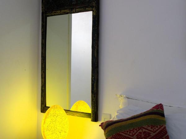 Casa Petunia Pousada Boutique : photo 8 de la chambre chambre double supérieure - b / f