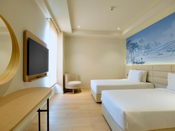 Cititel Express Kota Kinabalu : photo 3 de la chambre chambre lits jumeaux supérieure