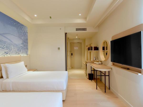 Cititel Express Kota Kinabalu : photo 4 de la chambre chambre lits jumeaux supérieure