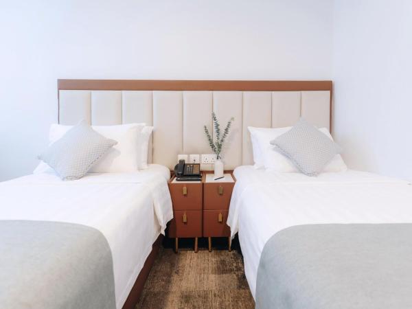 Santa Grand Hotel East Coast a NuVe Group Collection : photo 4 de la chambre chambre lits jumeaux supérieure