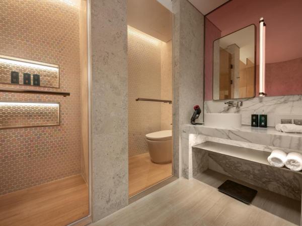 Hotel Indigo Wuxi Taihu New City : photo 5 de la chambre chambre lit king-size standard - vue sur jardin