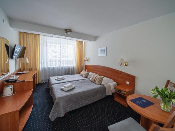 Zespół Dolina Białego - Pensjonat Biały Potok : photo 4 de la chambre chambre lits jumeaux