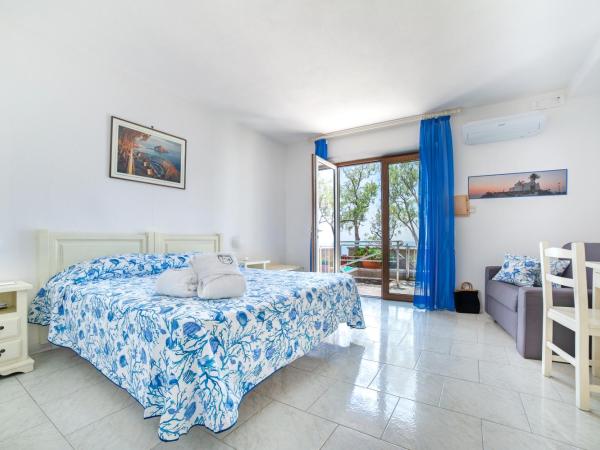 Punta Chiarito Resort : photo 1 de la chambre chambre double supérieure - vue sur mer