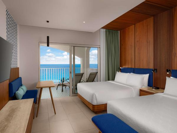 Hilton Cancun Mar Caribe All-Inclusive Resort : photo 1 de la chambre chambre premium avec 2 lits queen-size - vue sur océan