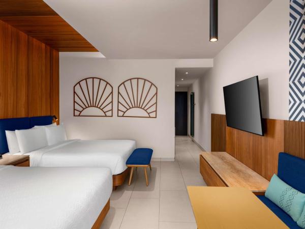 Hilton Cancun Mar Caribe All-Inclusive Resort : photo 3 de la chambre chambre avec 2 lits queen-size - vue sur océan