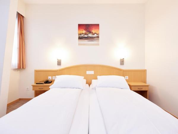 Central City Hotel Rochat : photo 3 de la chambre chambre double