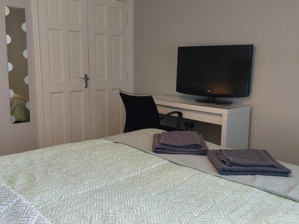 Lawnbrook Town House : photo 1 de la chambre chambre lit king-size