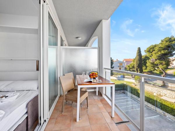 Resort del Mar : photo 8 de la chambre appartement familial avec balcon (2 adultes + 2 enfants)