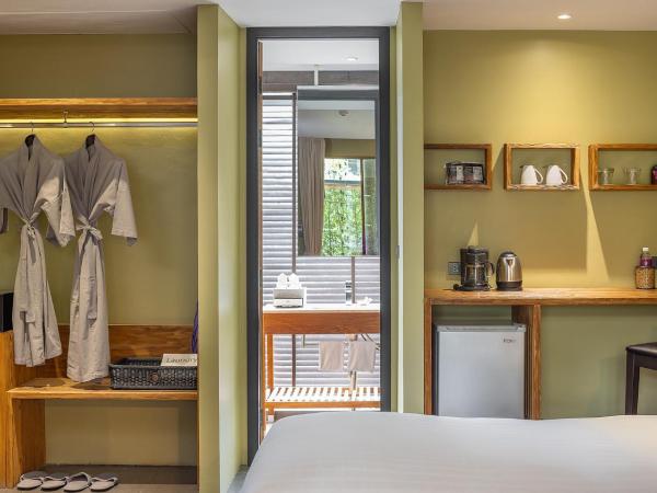 U Inchantree Kanchanaburi : photo 5 de la chambre deluxe connecting garden view 