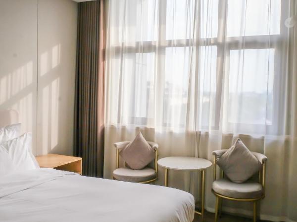 Shanghai JOYFUL YARD Hotel-Free shuttle bus from Pudong Airport and Disneylan : photo 8 de la chambre chambre lit queen-size deluxe