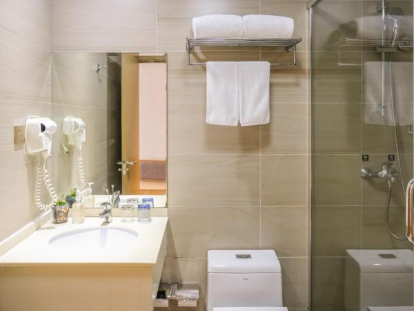 Shanghai JOYFUL YARD Hotel-Free shuttle bus from Pudong Airport and Disneylan : photo 2 de la chambre chambre standard lit queen-size