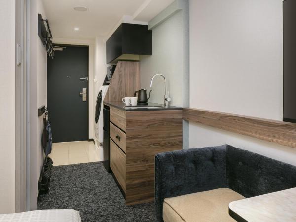 Tokyu Stay Nishi Shinjuku : photo 2 de la chambre chambre lits jumeaux résidentielle - non-fumeurs