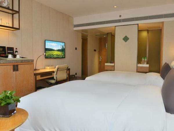 The Garden Hotel Guangzhou - Free shuttle between hotel and Exhibition Center during Canton Fair & Exhibitor registration Counter : photo 2 de la chambre chambre lits jumeaux e500