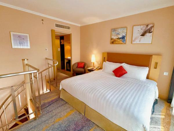 Beijing XinQiao Hotel : photo 2 de la chambre executive duplex family suite room