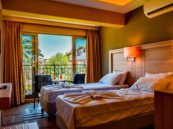 TURUNÇ BAY CONTİ BOUTIQUE HOTEL : photo 6 de la chambre chambre lits jumeaux - vue sur mer