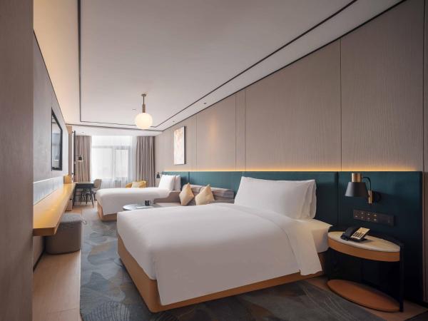 Hilton Garden Inn Beijing Temple Of Heaven East Gate Station : photo 5 de la chambre chambre lits jumeaux avec canapé-lit