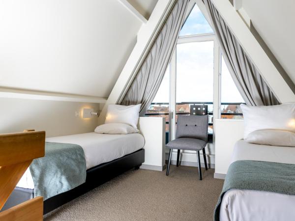 Martin's Brugge : photo 2 de la chambre chambre lits jumeaux confort avec baignoire