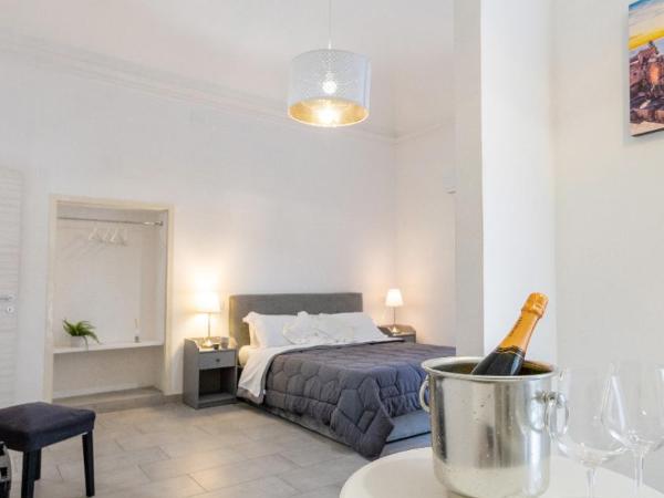 Duomo Luxury Suite Catania : photo 4 de la chambre chambre supérieure lit queen-size