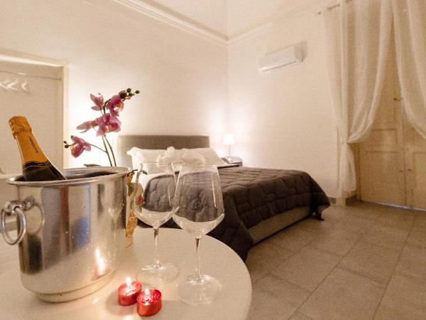 Duomo Luxury Suite Catania : photo 7 de la chambre chambre supérieure lit queen-size