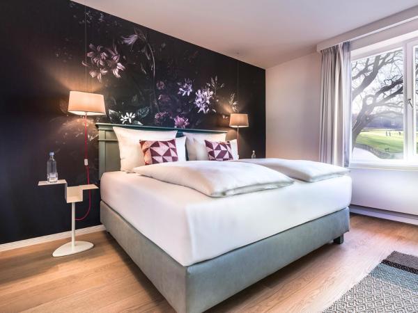 Steigenberger Hotel Treudelberg Hamburg : photo 1 de la chambre chambre double - vue sur jardin