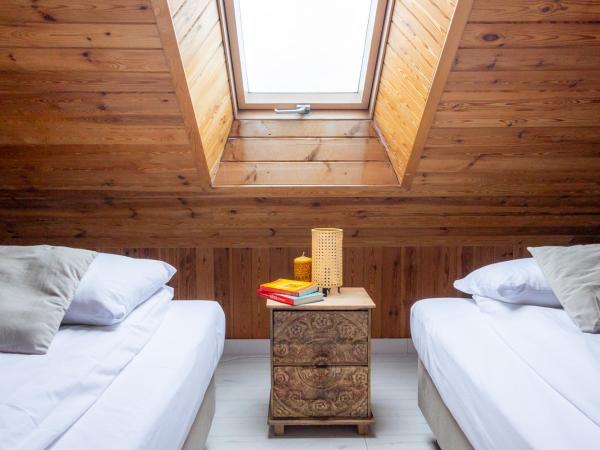 BlissHouse Cracow : photo 3 de la chambre chambre quadruple avec baignoire