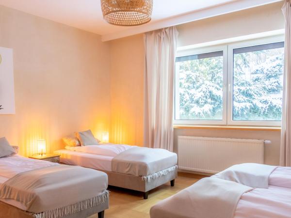 BlissHouse Cracow : photo 7 de la chambre chambre familiale avec salle de bains