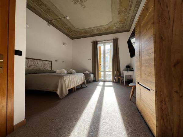 Hotel Genova Liberty : photo 1 de la chambre chambre triple avec balcon