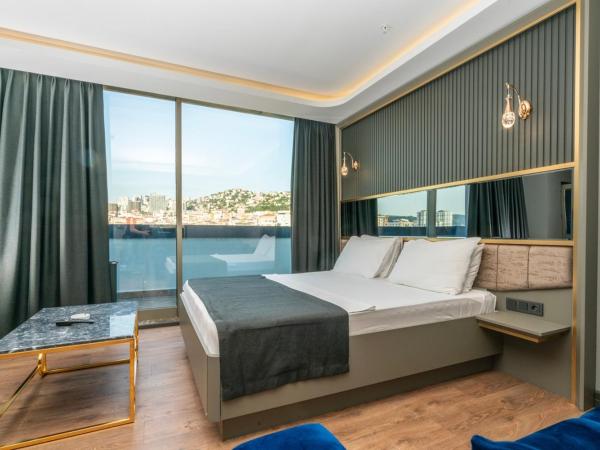 216 Ruby Suite : photo 1 de la chambre chambre double deluxe avec balcon