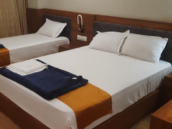 Astro Marine Hospitality Pvt Ltd : photo 1 de la chambre chambre triple deluxe