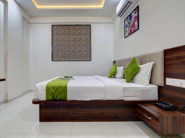 StayBird - NEST, A Premium Residences, Kharadi : photo 2 de la chambre chambre lit king-size