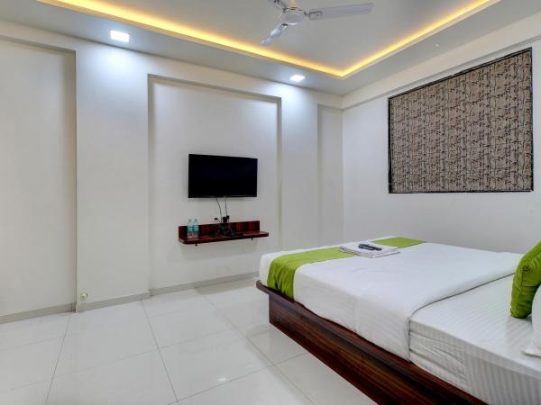 StayBird - NEST, A Premium Residences, Kharadi : photo 9 de la chambre chambre lit king-size