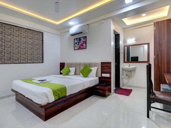 StayBird - NEST, A Premium Residences, Kharadi : photo 1 de la chambre chambre lit king-size