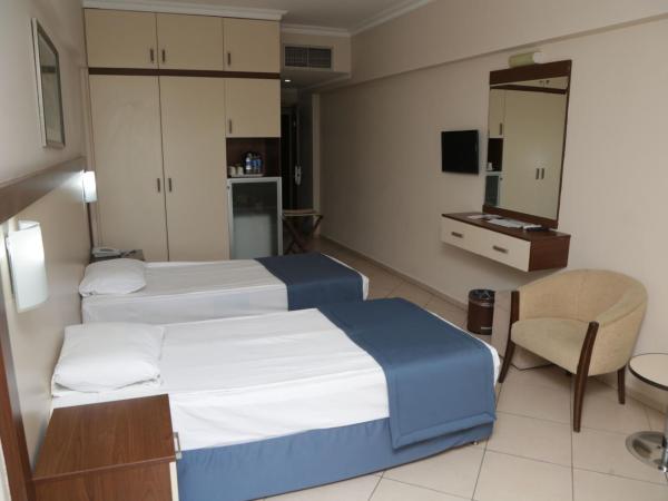 Batıhan Beach Resort & Spa : photo 5 de la chambre chambre double ou lits jumeaux - vue sur les terres

