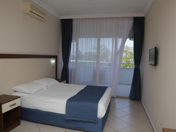 Batıhan Beach Resort & Spa : photo 4 de la chambre chambre double ou lits jumeaux - vue sur les terres

