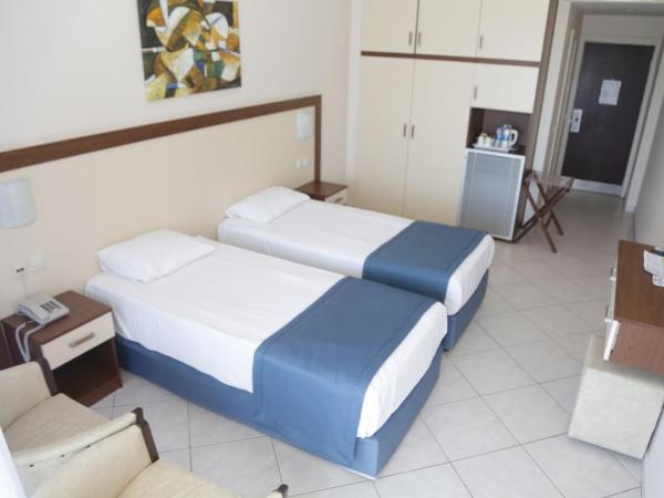 Batıhan Beach Resort & Spa : photo 3 de la chambre chambre double ou lits jumeaux - vue sur les terres

