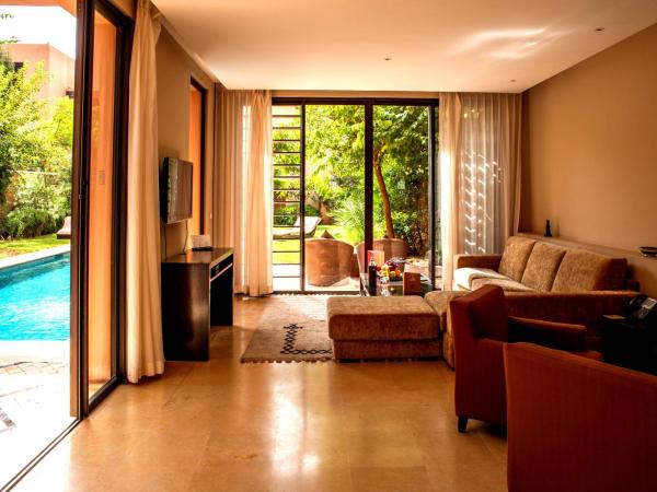 Al Maaden Villa Hotel & Spa : photo 3 de la chambre villa 2 chambres avec piscine sans vis-à-vis