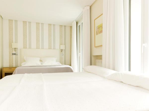 Hotel Sauce : photo 1 de la chambre  chambre double avec 2 lits d'appoint